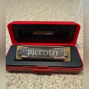 Hohner Silver Harmonica with Red Case